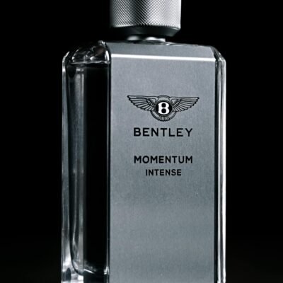 Luxury Bentley Momentum Intense cologne bottle in a sleek design, ideal for fragrance enthusiasts.